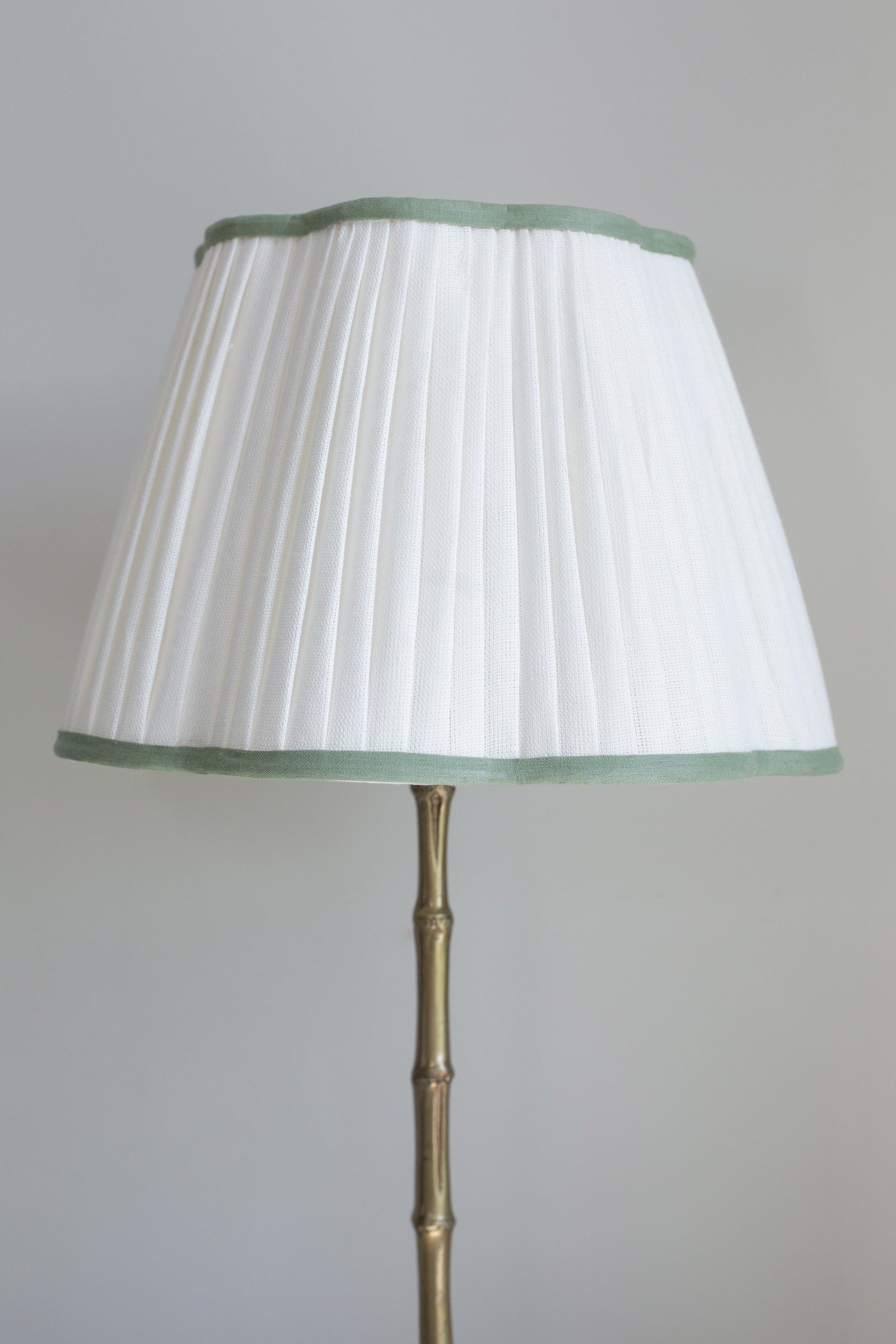 Scalloped linen ivory lampshade with sage green trim